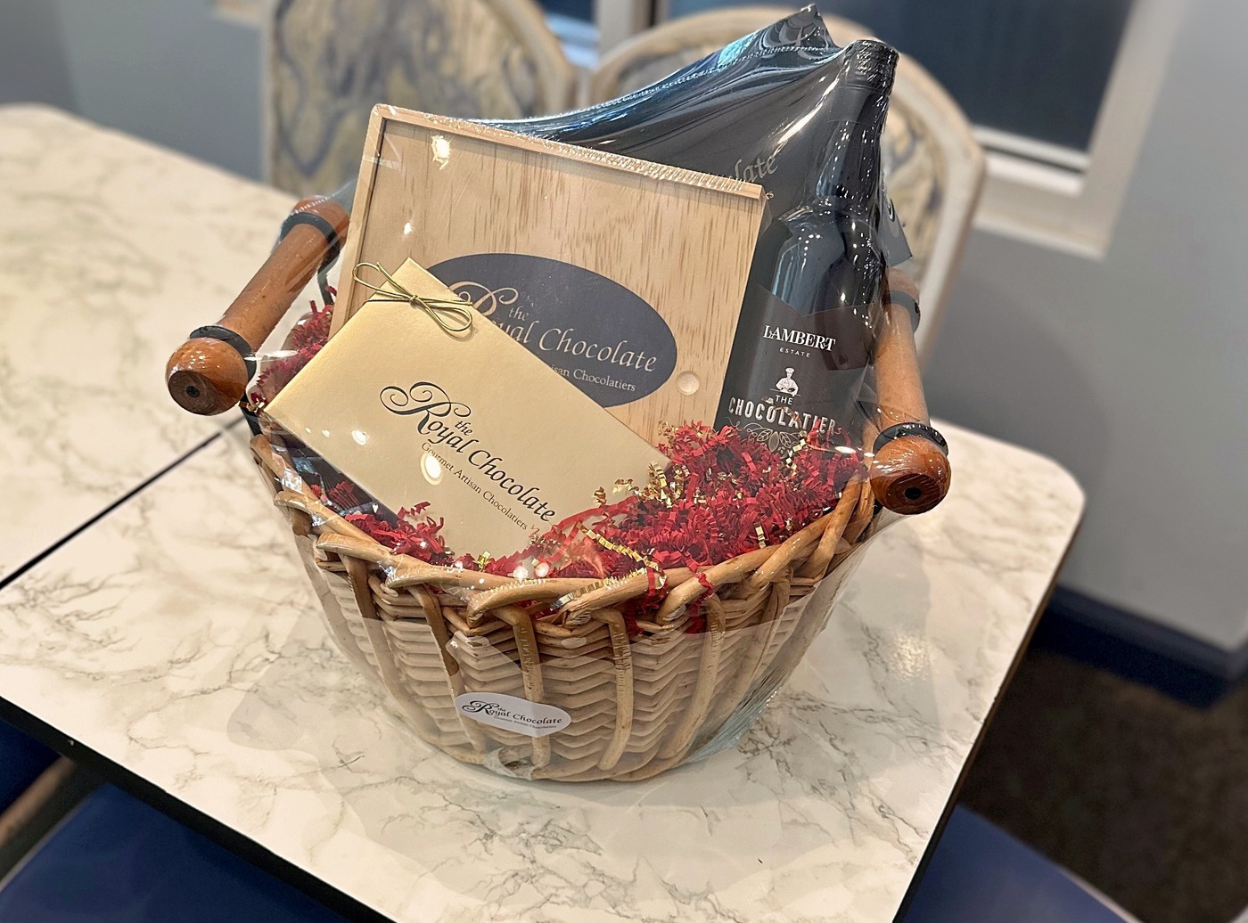 Royal Chocolate gift basket with wine, fudge, and assorted chocolates